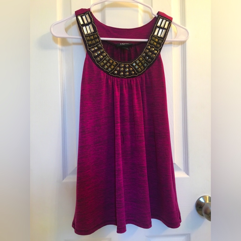 Embellished tank